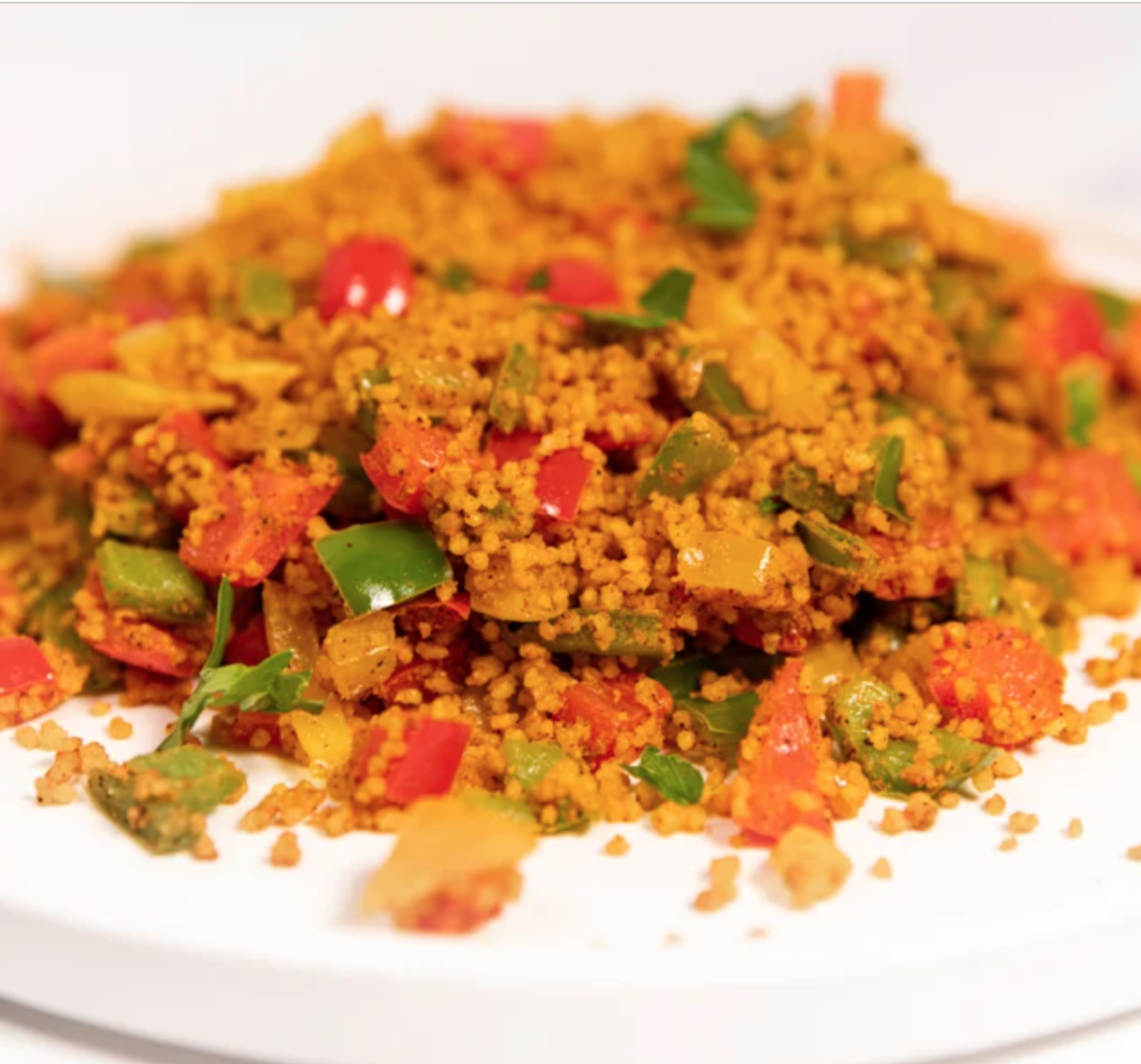 Pierna de cordero deshuesada al horno con verdura y cuscus con curcuma y canela